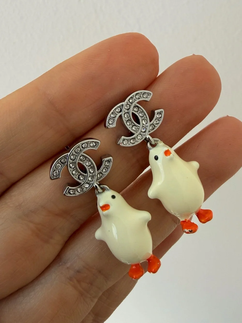 CHANEL White Enamel Chicken CC Drop Earrings with Orange Accents